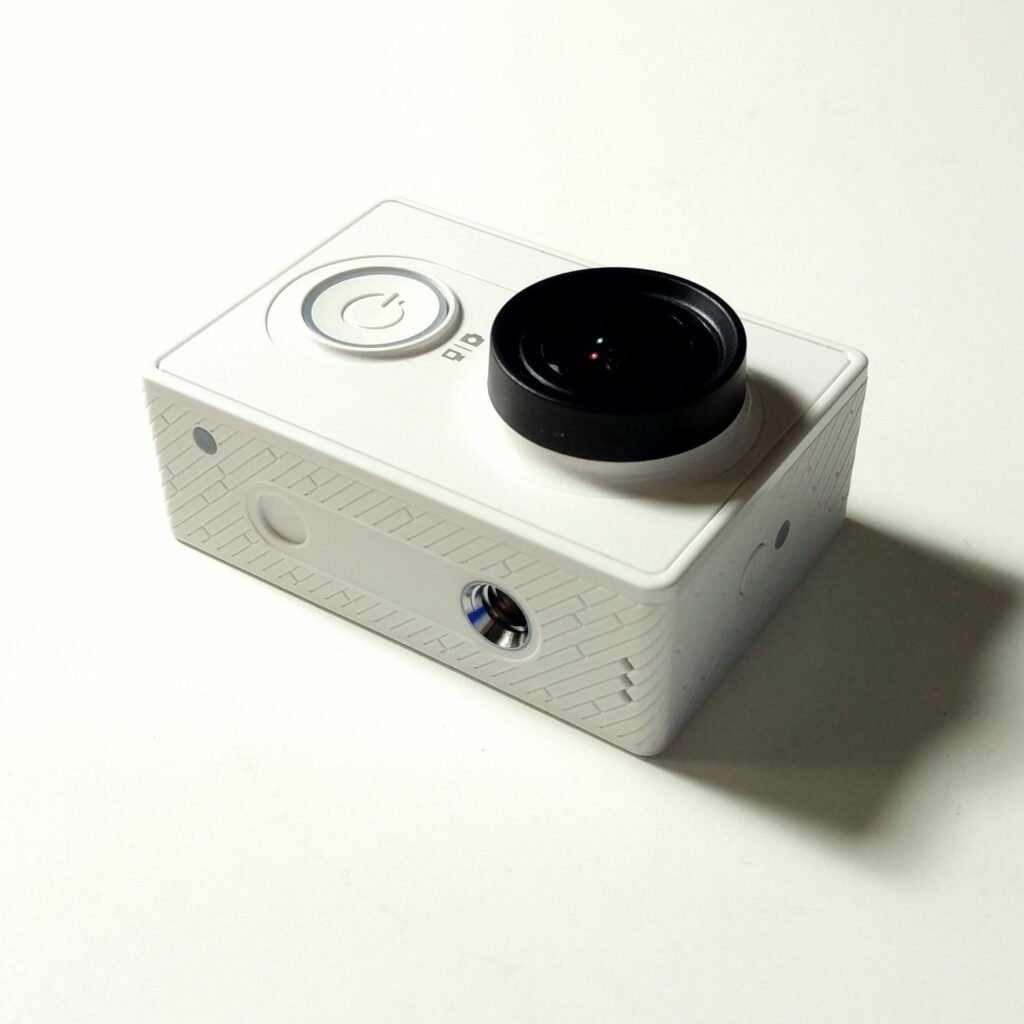 An action camera mounted for outdoor adventure filming