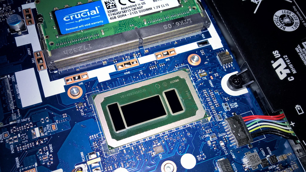 A laptop computer with a close-up view suggesting its internal processor