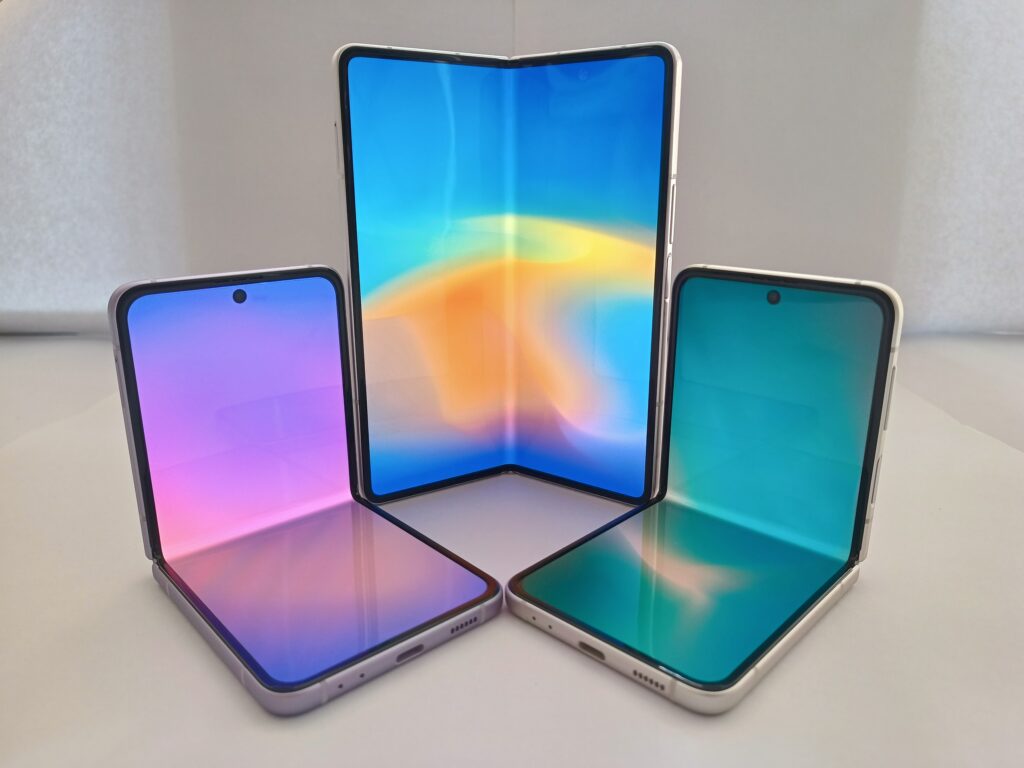 A foldable smartphone shown open, displaying its hinge mechanism