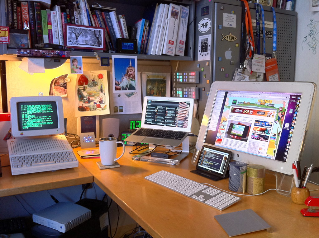 A gaming monitor displaying colorful content on a desk setup (oled)