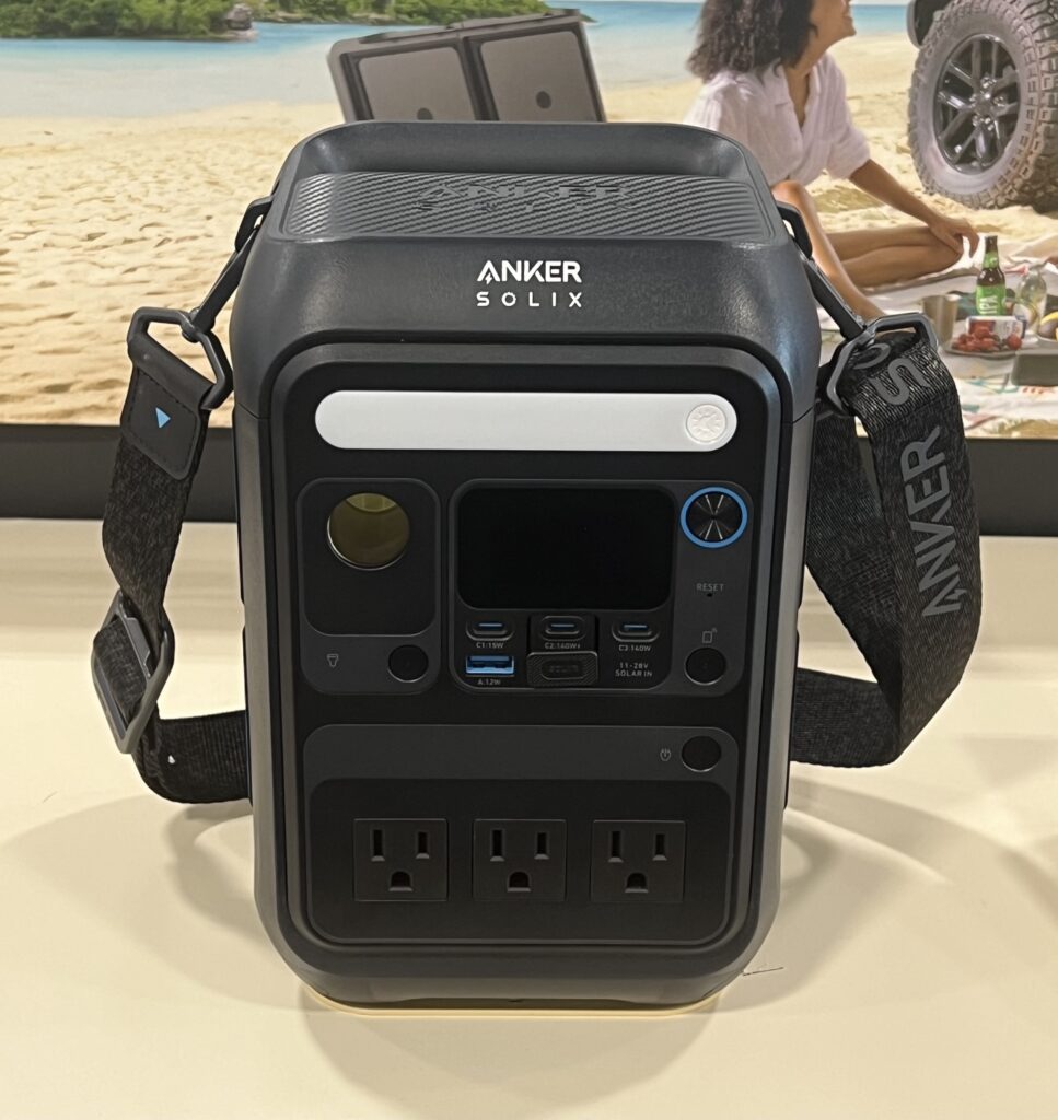 A portable power station sitting outdoors