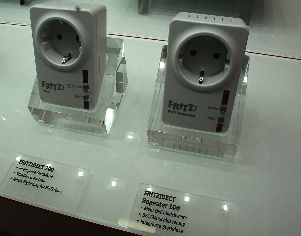 A smart plug connected to a wall outlet (smart plug energy monitoring)