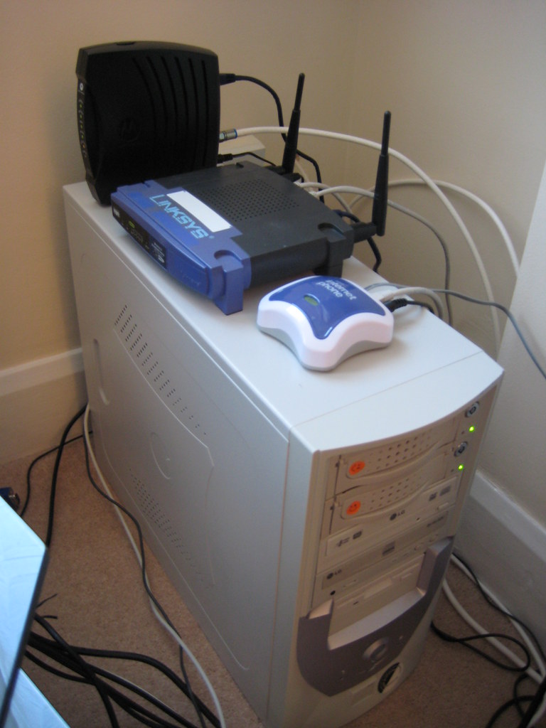 A home wifi router with network cables connected