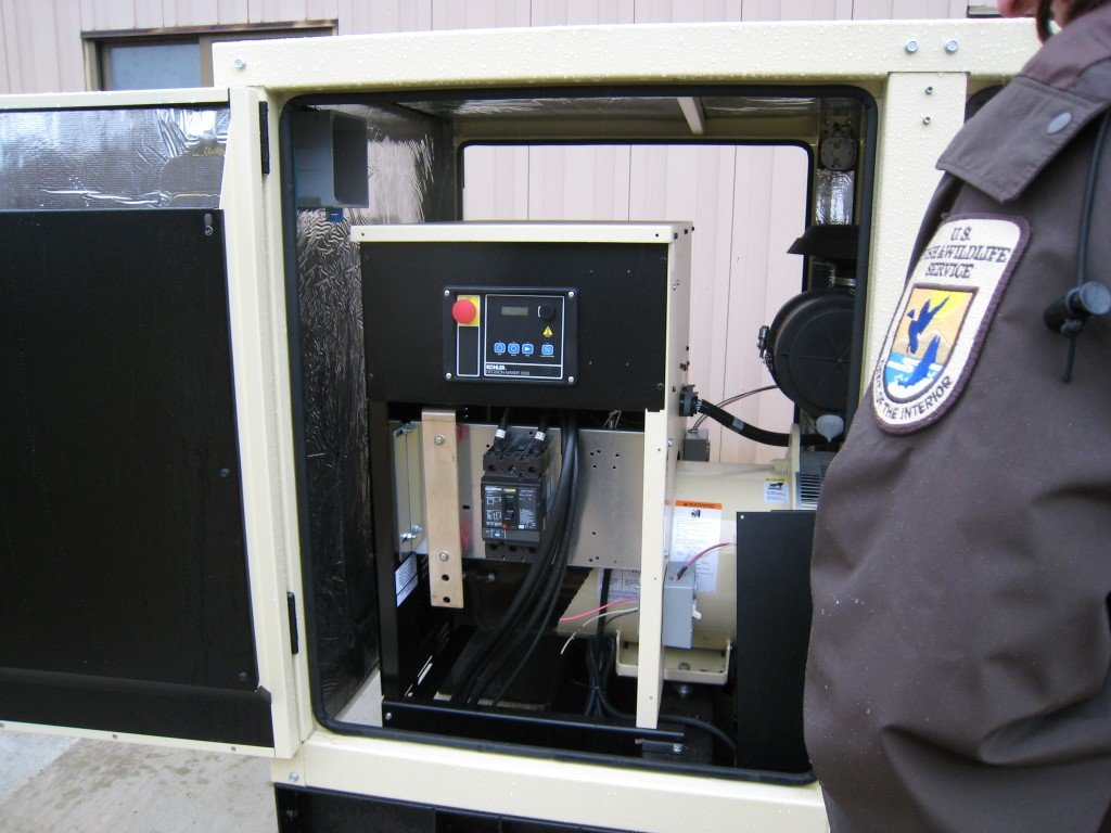 The inside of a backup power generator cabinet (home generator)