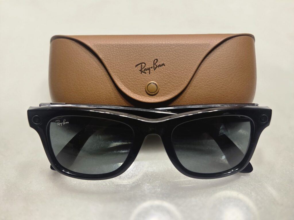 Ray-Ban Meta smart glasses next to their leather case (meta ray-ban smart glasses)